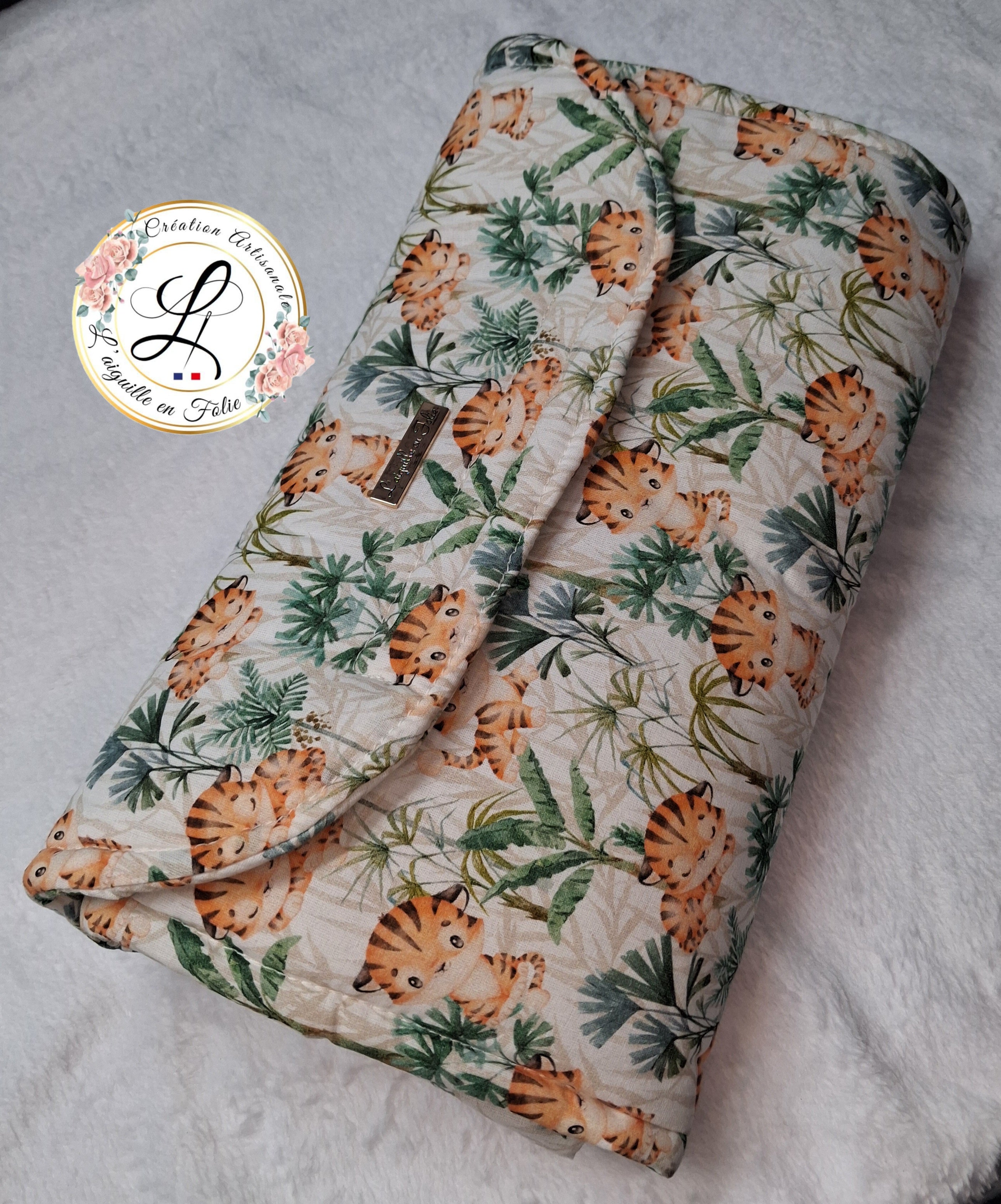 tapis a langer nomade